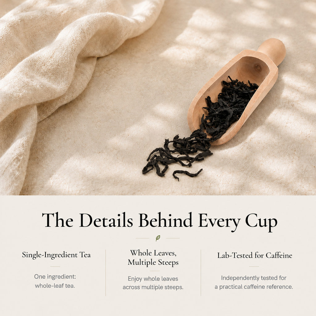 Ember Roast Black Tea twisted whole leaves in a wooden scoop: single-ingredient tea, good for multiple steeps, lab-tested for caffeine
